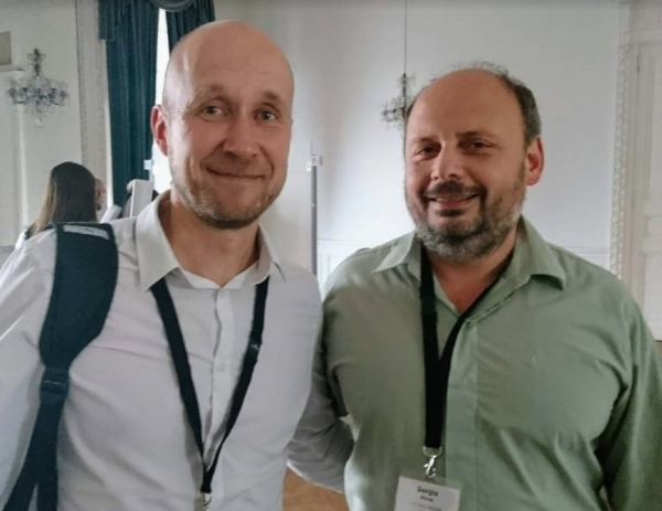 Dr. Teesalu (left) with Dr. Sergio Moya (the organizer of the workshop on self assembly and hierarchical materials in biomedicine in San Sebastián, Spain